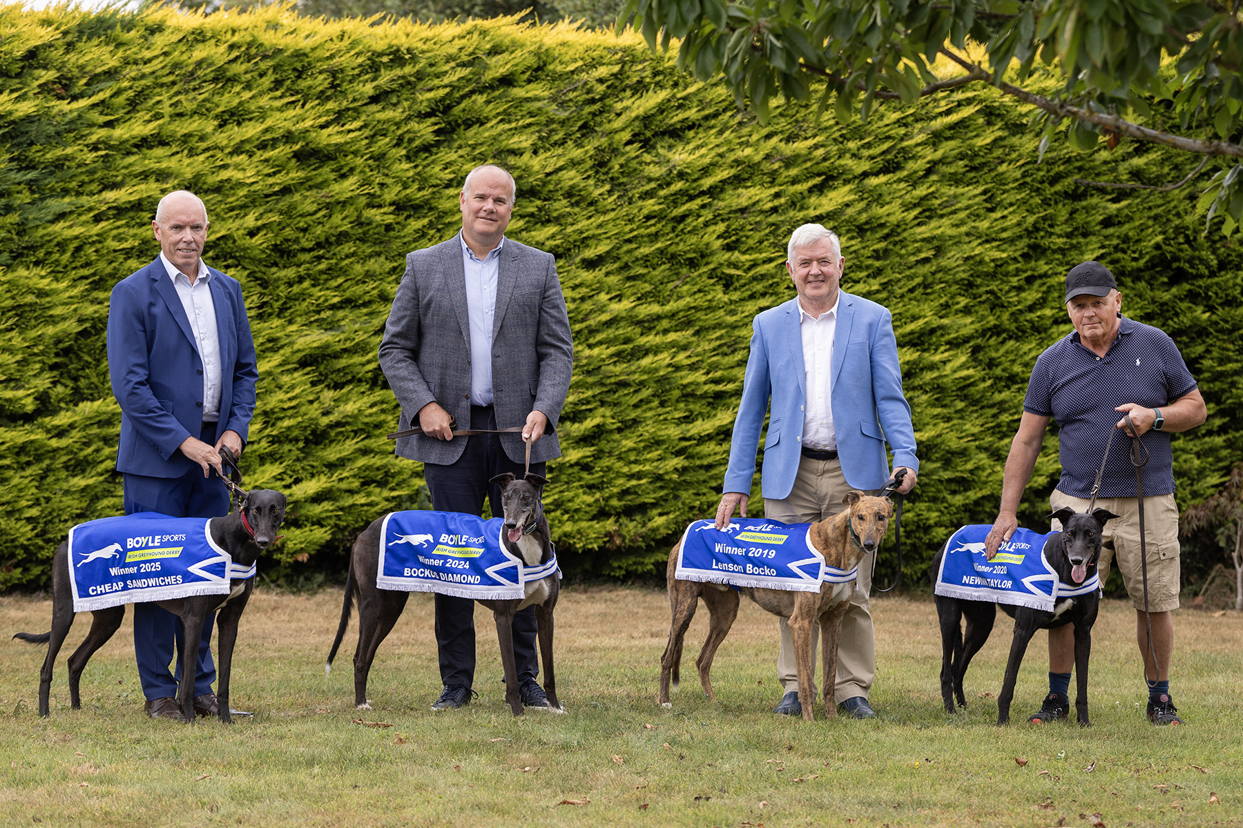 Pictured at the launch of the 2026 BOYLE Sports Irish Greyhound Derby at Riverside Kennels in Tipperary were L-R: Tim Lucey CEO Greyhound Racing Ireland with 2025 winner Cheap Sandwiches, Kieran Holden Sponsorship Manager BOYLE sports with 2024 winner Bockos Diamond, Pat Flanagan Chairman Greyhound Racing Ireland with 2019 winner Lenson Bocko and Graham Holland Riverside Kennels with 2020 winner Newinn Taylor. Picture shows the launch of the 2026 BOYLE Sports Irish Greyhound Derby at Riverside Kennels in Tipperary were L-R: Tim Lucey CEO Greyhound Racing Ireland with 2025 winner Cheap Sandwiches, Kieran Holden Sponsorship Manager BOYLE sports with 2024 winner Bockos Diamond, Pat Flanagan Chairman Greyhound Racing Ireland with 2019 winner Lenson Bocko and Graham Holland Riverside Kennels with 2020 winner Newinn Taylor.