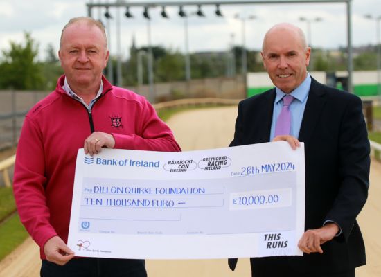 Tim Lucey, CEO of Greyhound Racing Ireland presenting Dan Quirke, Founder Dillon Quirke Foundation with a cheque of €10,000 raised at the Jerseys At The Dogs Nationwide Bucket Collection hosted at greyhound stadia nationwide in April.  